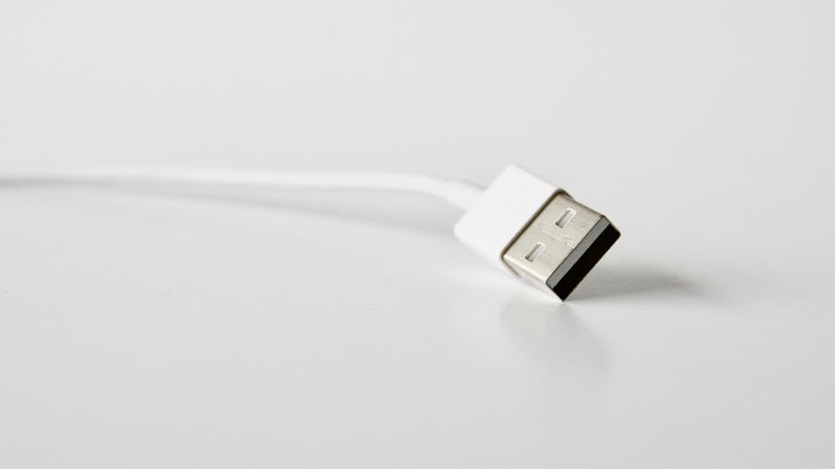 A detailed close-up image of a USB cable, perfect for technology-related projects.