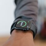 A modern smartwatch displays a "Ready" status on a person's wrist in focus.